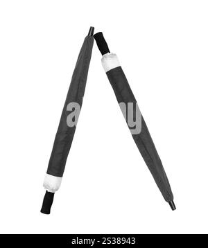 Ombrelli ripiegati isolati su sfondo bianco. Ombrelli ripiegati Foto Stock