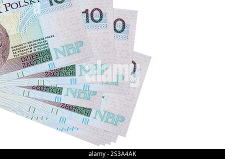 10 banconote zloty polacche si trovano in un piccolo mazzo o in una confezione isolata sul bianco. Mockup con spazio di copia. Concetto di business e cambio valuta. 10 zloty polacco Foto Stock