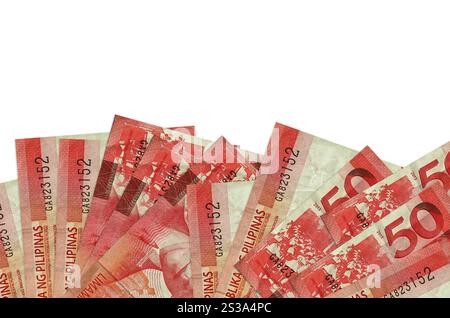 50 polizze filippine piso giace sul lato inferiore dello schermo isolato su sfondo bianco con spazio di copia. Modello di banner di background per i concetti aziendali Foto Stock
