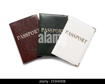 Passaporti diversi isolati su sfondo bianco Foto Stock