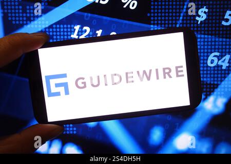 Polonia. 9 gennaio 2025. In questa illustrazione fotografica, il logo della società Guidewire software viene visualizzato sullo schermo di uno smartphone. (Credit Image: © Piotr Swat/SOPA Images via ZUMA Press Wire) SOLO PER USO EDITORIALE! Non per USO commerciale! Foto Stock