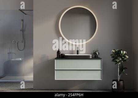 Bagno minimalista con lavandino galleggiante con specchio rotondo, progettato con linee pulite ed eleganza moderna. Foto Stock