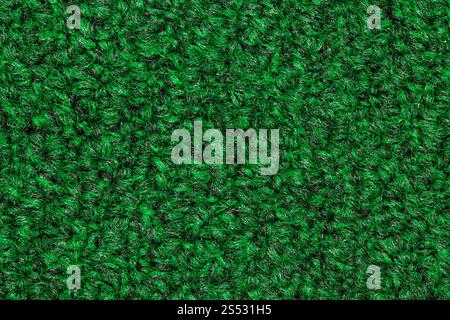 Tappeto in filato di nylon verde, sfondo testurizzato, esempio di dettaglio. Foto Stock