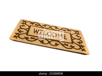 Foto di un tappeto di benvenuto isolato su uno sfondo bianco. tappetino della portiera di benvenuto isolato Foto Stock