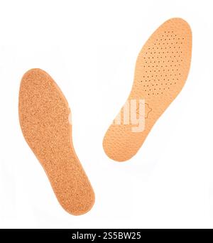 Solette bianche isolate su sfondo bianco. Solette per scarpe bianche Foto Stock
