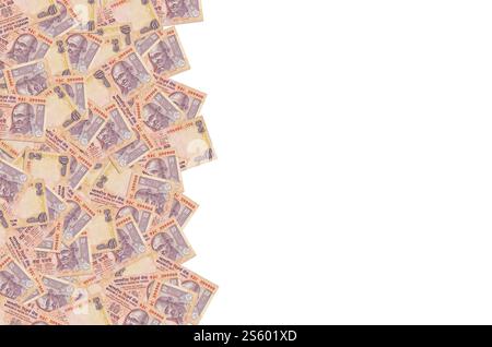 Mahatma Gandhi affronta la banconota indiana con dieci rupie. 10 Rupia valuta nazionale dell'India INR. Primo piano della banconota Orange Money. Mahatma Gandhi faccia a faccia Foto Stock