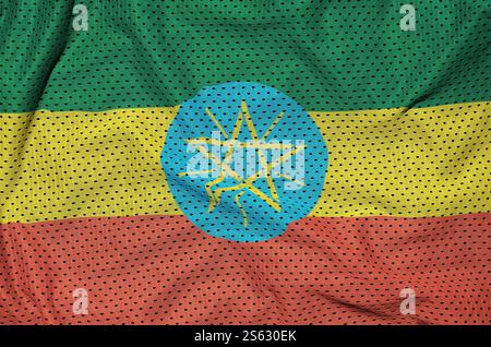 Bandiera dell'Etiopia stampata su un tessuto in poliestere nylon sportivo con alcune pieghe. Bandiera Etiopia stampata su maglia fabri in nylon poliestere Foto Stock