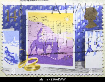 ISTANBUL, TURCHIA - 25 GENNAIO 2021: Spettacoli di francobolli in Gran Bretagna biglietti di Natale, viaggio a Betlemme intorno al 1988 Foto Stock