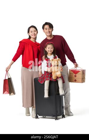 Famiglia felice che fa un viaggio di Capodanno Foto Stock