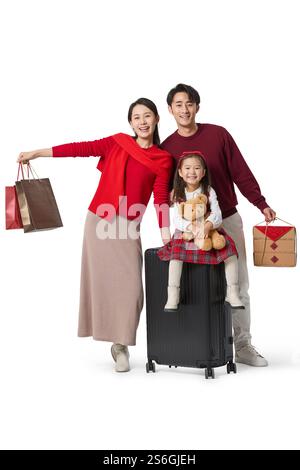 Famiglia felice che fa un viaggio di Capodanno Foto Stock