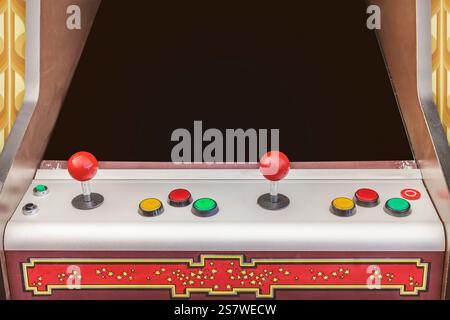 Videogiochi arcade vintage degli anni Settanta con schermo nero e spazio per copie Foto Stock
