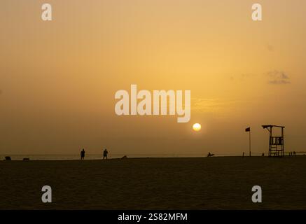Tramonto sulla spiaggia Foto Stock