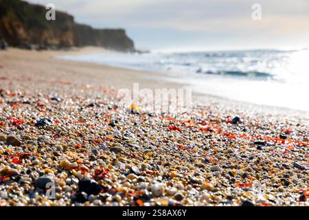 Ciottoli sulla spiaggia, Mitchell Rocks, regione di Otago, nuova Zelanda Foto Stock