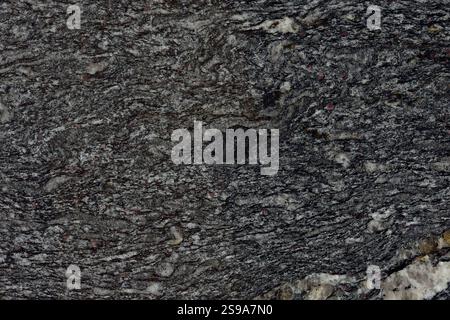 Motivo naturale del disco lucidato color grigio granito minerale. Altissima risoluzione. GRANITE Black Cosmic, San Pietroburgo Foto Stock