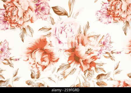 Frammento di colorato motivo in tessuto rétro con ornamento floreale utile come sfondo. Tessuto o tessuto floreale, foto macro. Trama del tessuto. ti Foto Stock