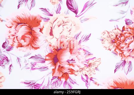 Frammento di colorato motivo in tessuto rétro con ornamento floreale utile come sfondo. Tessuto o tessuto floreale, foto macro. Trama del tessuto. ti Foto Stock