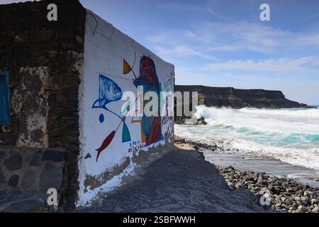 Sulla spettacolare costa nel piccolo villaggio di Puertito de Los Mo Foto Stock