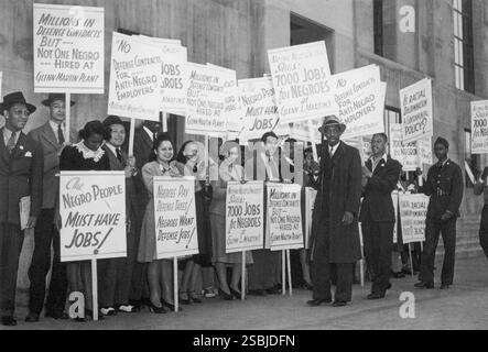 Glenn Martin si radunò per lavori di difesa. Gli uomini e le donne di colore sono stati discriminati per lavori di guerra. Le forze armate continuano a essere segregate fino al 1948. Foto Stock