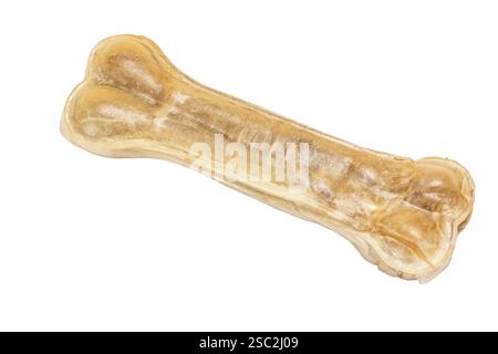 Osso mastice artificiale per cani su sfondo bianco isolato. Vista dall'alto. Concetto di alimenti per animali domestici o animali. Foto Stock