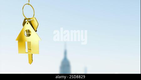 Immagine del portachiavi della casa dorata su sfondo sfocato del paesaggio urbano Foto Stock