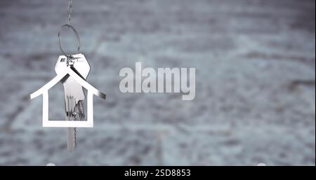 Immagine del portachiavi della casa su sfondo sfocato Foto Stock