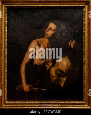 Parigi, Francia - 02 09 2025: Buio e luce. David con la testa di Golia dipinto da Jusepe de Ribera Foto Stock