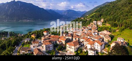 Lago Lugano, Italia . Idilliaco paesaggio lacustre e incantevoli paesini di Claino e Osteno, vista panoramica aerea. Regione Lombardia, provincia di Como Foto Stock