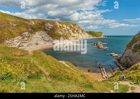 San Oswalds Bay e UOMO O'guerra Cove presso la porta di Durdle Cliff formazione nelle vicinanze Lulworth, Dorset, Sud Inghilterra, Regno Unito Foto Stock