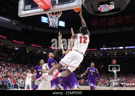 Columbus, Ohio, Stati Uniti. 12 febbraio 2025. La guardia dei Washington Huskies LUIS KORTRIGHT (12) si è strappata al contrario durante la partita tra i Washington Huskies e gli Ohio State Buckeyes alla Value City Arena. (Credit Image: © Scott Stuart/ZUMA Press Wire) SOLO PER USO EDITORIALE! Non per USO commerciale! Foto Stock