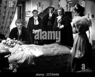 MIMI [BR 1935] GERTRUDE LAWRENCE [a letto], DOUGLAS FAIRBANKS JR, [resto non identificato] data: 1935 Foto Stock