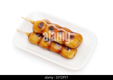 Dolciumi tradizionali giapponesi, dessert fatto di torta di riso, si chiama Mitarashi dango. Foto Stock