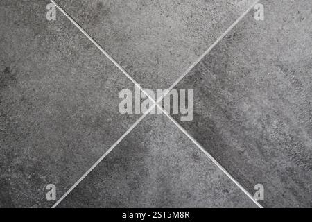 Struttura del pavimento grigio scuro piastrelle in ceramica come sfondo, vista dall'alto Foto Stock