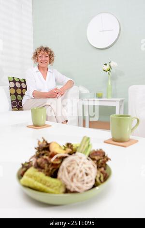 Sala terapia. Ritratti rilassati di una terapista nella sua Green Room. Da una serie di immagini correlate. Foto Stock