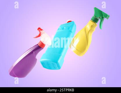Diversi prodotti per la pulizia in aria su sfondo viola Foto Stock