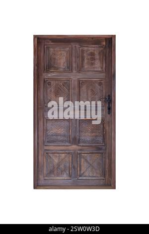 Massicce porte in legno con intricati intagli e motivi floreali, un tempo parte di un vecchio edificio cittadino, che mostra l'artigianato storico e l'eleganza Foto Stock