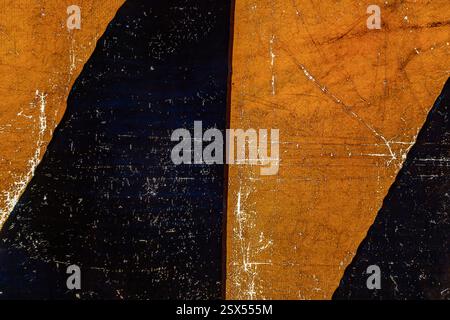 schema di sfondo astratto della tenda di tela. Texture colorata di una vecchia tenda da circo che forma figure grafiche gialle e nere. Composizione del geom astratto Foto Stock