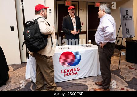 Washington, Stati Uniti. 23 febbraio 2025. The Leaving Maga Organizations table al Principles First Summit di Washington, DC Credit: SOPA Images Limited/Alamy Live News Foto Stock