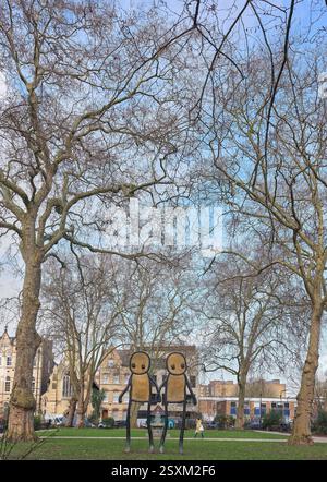 Tenersi per mano, Hoxton Square, Shoreditch, Hackney area di Londra, Inghilterra. Foto Stock