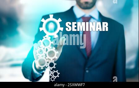 testo del seminario manuale uomo d'affari sullo schermo Foto Stock