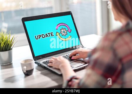 Lo schermo del laptop visualizza un concetto di aggiornamento Foto Stock