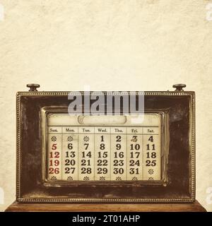 Immagine in tonalità seppia di un antico calendario ornamentale da scrivania Foto Stock