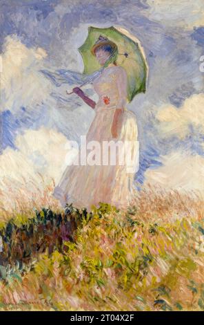 Claude Monet, donna con un ombrello, si voltò a sinistra, pittura impressionista ad olio su tela, 1886 Foto Stock