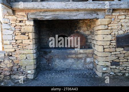 Forno comune nella frazione di Urval nella regione francese della Dordogna. Il sito del forno risale ai tempi feudali e alle usanze del Medioevo. Foto Stock