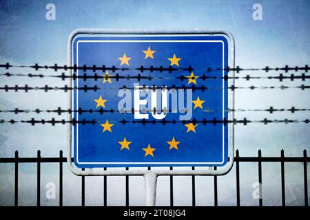 FOTOMONTAGE, EU-Schild hinter Stacheldraht, Symbolfoto EU-Außengrenzen und Migrationskrise *** FOTOMONTAGGIO, insegna UE dietro filo spinato, foto simbolo EU frontiere esterne e crisi migratoria credito: Imago/Alamy Live News Foto Stock