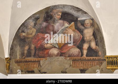 Urbania (Italia, Marche - provincia di Pesaro-Urbino), Oratorio del Corpus Domini. Raffellino del Colle, ciclo di affreschi nelle lunette con Sibille alternate a Profeti (parete destra) Foto Stock