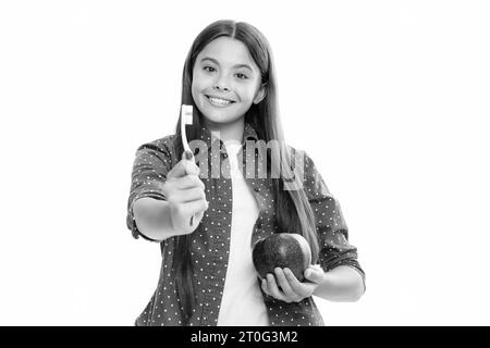 Vitamine di mela per denti sani. Ritratto di una bambina adolescente felice e sorridente Foto Stock