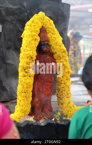 Idolo di pietra del Dio indù Hanuman Foto Stock
