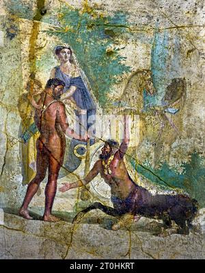 Eracle con Illo in armi, guarda il centauro Nessus. Accanto a loro Deianira. La città romana di fresco Pompei si trova vicino a Napoli, nella regione Campania. Pompei fu sepolta sotto 4-6 m di cenere vulcanica e pomice nell'eruzione del Vesuvio nel 79 d.C. Italia Foto Stock