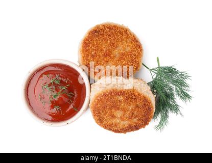 Gustose cotolette di carne, aneto e salsa su sfondo bianco Foto Stock