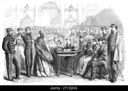 Presentazione delle medaglie ai veterani di Garibaldi nella grande Piazza, Napoli, 1860. I soldati italiani sono decorati. 'Quasi l'ultimo atto di Garibaldi, prima di chiudere la sua carriera, per l'epoca, in Italia fu quello di assistere alla cerimonia di consegna della medaglia commemorativa alla band prescelta che sbarcò con lui a Marsala l'11 maggio scorso. Si radunarono quel giorno 1080, ma di questi solo 426 sopravvissero per ricevere la decorazione. La presentazione si è svolta in largo del Palazzo il 4 novembre. La cavalleria ungherese, un gruppo di compagni dall'aspetto nobile, si trovava di fronte al palazzo. Lì Foto Stock